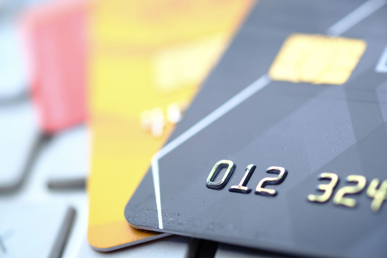 The Art of Drawing Readers In: Your attractive post title goes here High-quality close-up of credit and debit cards, highlighting technology and security.